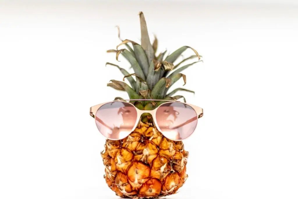 a picture of a Pineapple With UV Sunglasses
