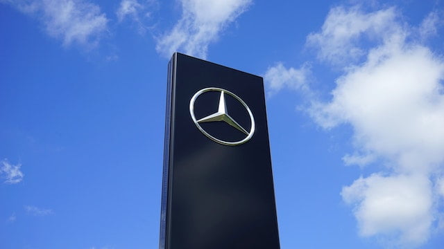 A picture of the Mercedes logo to signify the importance of having a unique logo when starting a clothing business